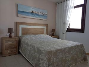 Voodi või voodid majutusasutuse Lovely Apartment close to the Beach Apartamerica LA140 toas