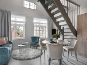 Posedenie v ubytovaní Lavoo Boutique Apartments