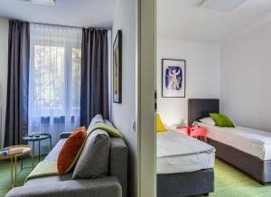 Posteľ alebo postele v izbe v ubytovaní B&B Julinek Park