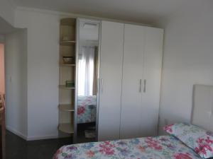 Katil atau katil-katil dalam bilik di Apartamento na Praia dos Ingleses