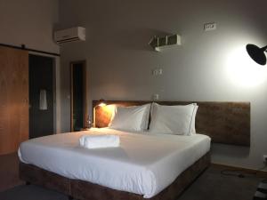 Cama ou camas em um quarto em XPT Águeda - Alojamento Local