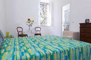Postel nebo postele na pokoji v ubytování B&B Domus Aurea