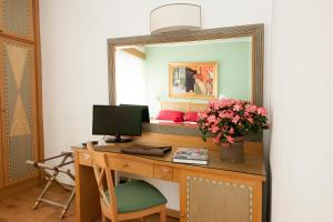 TV a/nebo společenská místnost v ubytování Hotel Touring