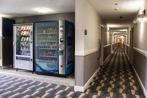 a vending machine in the hallway of a building at Microtel Inn by Wyndham Chattanooga Hamilton Place in Chattanooga