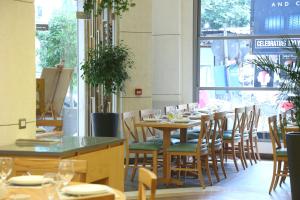 Restoran või mõni muu söögikoht majutusasutuses Serenada Golden Palace - Boutique Hotel