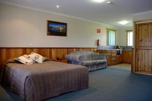 Säng eller sängar i ett rum på Kentish Hills Retreat