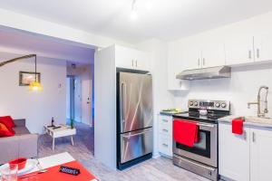 Η κουζίνα ή μικρή κουζίνα στο Les appartements HOMA