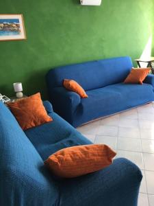 A seating area at Appartamento Villa Panorama