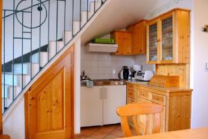 Kuchnia lub aneks kuchenny w obiekcie THERMEN - APARTMENT BIODORF Bad Waltersdorf