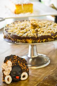 a chocolate cake with a black face on a plate at Villa dos Corais in Morro de São Paulo