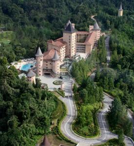 an aerial view of a resort in the mountains at The Chateau Spa & Wellness Resort in Bukit Tinggi