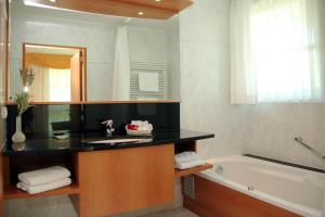 Koupelna v ubytování Hotel Iris