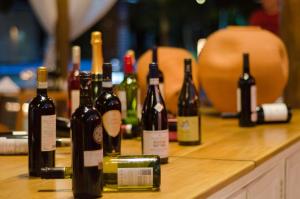 a group of bottles of wine sitting on a counter at Villa dos Corais in Morro de São Paulo