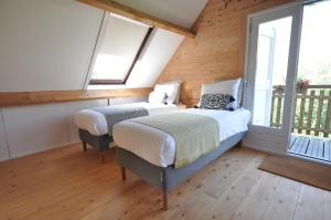 Posteľ alebo postele v izbe v ubytovaní B&B Nieuwe Brug