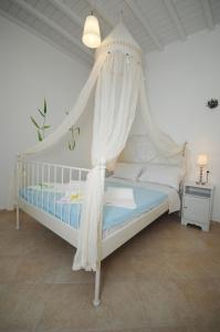 Ένα ή περισσότερα κρεβάτια σε δωμάτιο στο Lino Apartments