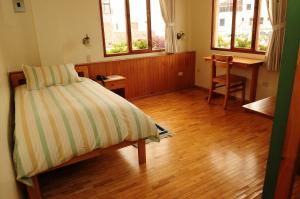 Postel nebo postele na pokoji v ubytování Hotel Rincon Aleman