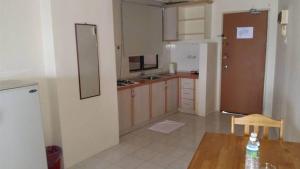 Dapur atau dapur kecil di Lumut Valley Resort Condominium