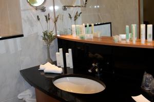 Koupelna v ubytování Hotel Iris