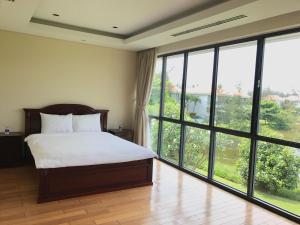 Giường trong phòng chung tại 3 Bedrooms Villa with Private pool