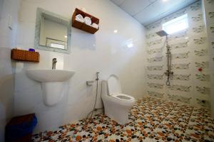 Koupelna v ubytování Q Songchi Hotel + 33 fotografií
