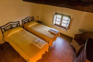 Letto o letti in una camera di Frantoio di Corsanico