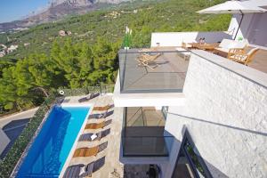 Bazén v ubytovaní Villa Olive Hill alebo v jeho blízkosti