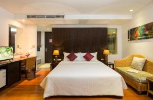 Postel nebo postele na pokoji v ubytování i Tara Resort & Spa
