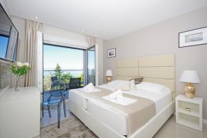Posteľ alebo postele v izbe v ubytovaní Villa Olive Hill