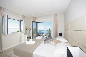 Posteľ alebo postele v izbe v ubytovaní Villa Olive Hill