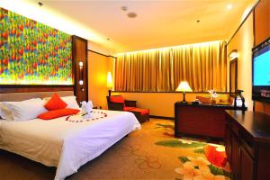 Łóżko lub łóżka w pokoju w obiekcie Riyuegu Hotsprings Resort