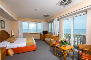 Posezení v ubytování City Hotel + 37 fotografií