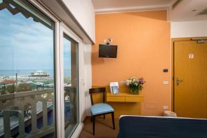 TV a/nebo společenská místnost v ubytování City Hotel