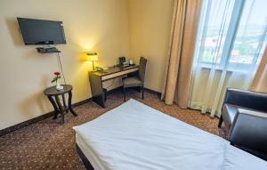 Sjónvarps- og/eða afþreyingartæki á Hotel Lomsia
