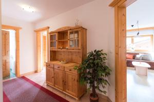 Łóżko lub łóżka w pokoju w obiekcie Appartement Alpina