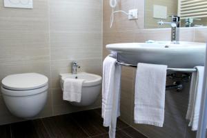 Koupelna v ubytování Hotel Caesar