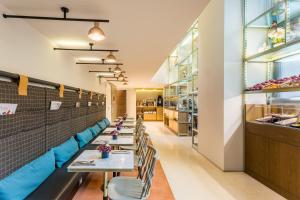 A seating area at Room Mate Collection Giulia, Milan
