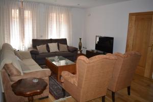 TV a/nebo společenská místnost v ubytování Apartamentos Alameda