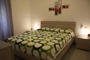 Postel nebo postele na pokoji v ubytování B&B Castello Salvaterra