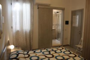 Postel nebo postele na pokoji v ubytování B&B Castello Salvaterra