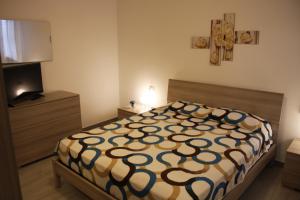 Postel nebo postele na pokoji v ubytování B&B Castello Salvaterra