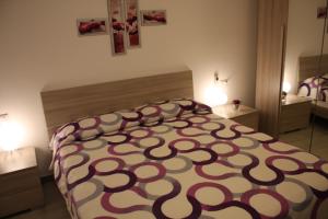 Postel nebo postele na pokoji v ubytování B&B Castello Salvaterra