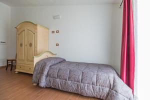 Rifugio Gorropu客房内的一张或多张床位