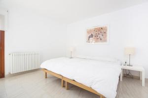 Postel nebo postele na pokoji v ubytování Es Garrover + 22 fotografií