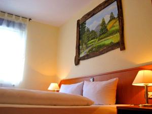 Postel nebo postele na pokoji v ubytování Hotel Harzlodge