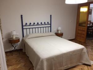 Postel nebo postele na pokoji v ubytování Apartamentos Alameda