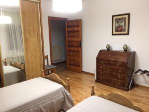 Postel nebo postele na pokoji v ubytování Apartamentos Alameda