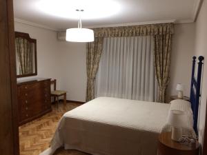 Postel nebo postele na pokoji v ubytování Apartamentos Alameda