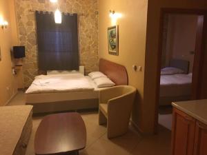 Postel nebo postele na pokoji v ubytování Hotel Portal