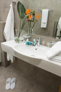 Koupelna v ubytování Methexis Boutique Hotel + 37 fotografií