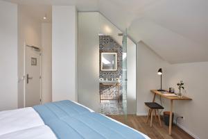 Postel nebo postele na pokoji v ubytování Hygge Hotel